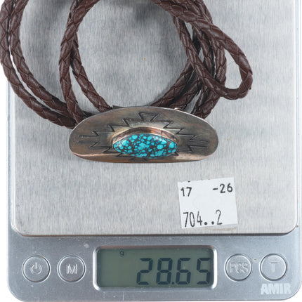 Vintage Navajo sterling silver bolo tie with spiderweb turquoise