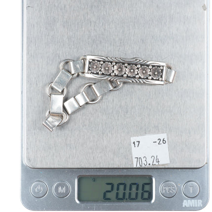 7" vintage Kee Montoya Navajo sterling silver link bracelet with flower bar