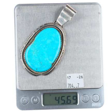 Big Vintage Navajo sterling silver pendant with large turquoise stone