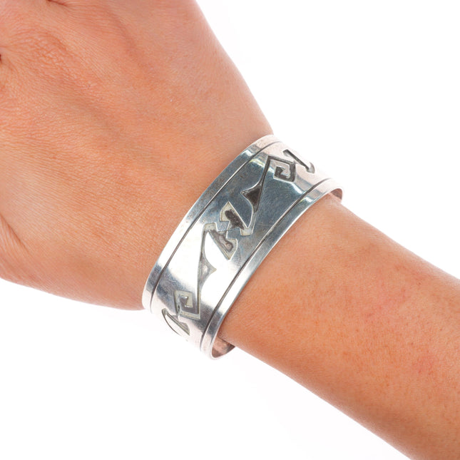 6.5" Vintage Navajo sterling silver cuff bracelet with overlay geometric designs