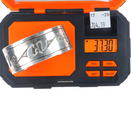 6.5" Vintage Navajo sterling silver cuff bracelet with overlay geometric designs