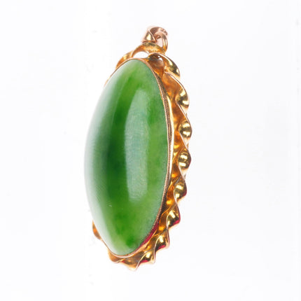 Vintage 9ct gold green jade necklace pendant with twisted rim