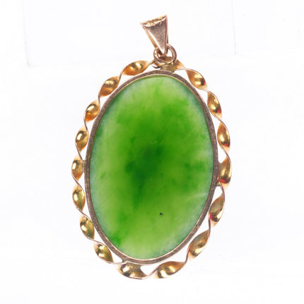 Vintage 9ct gold green jade necklace pendant with twisted rim