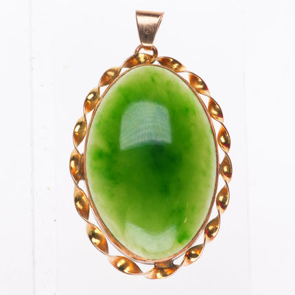 Vintage 9ct gold green jade necklace pendant with twisted rim