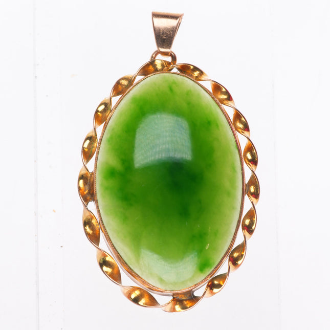 Vintage 9ct gold green jade necklace pendant with twisted rim
