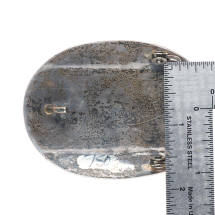R.A. Lewis Navajo sterling silver belt buckle with intricate overlay pattern