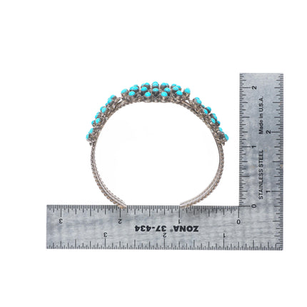 6.1" vintage Wayne Johnson Sr. Sterling silver Snake eye turquoise cuff bracelet