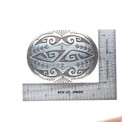 R.A. Lewis Navajo sterling silver belt buckle with intricate overlay pattern