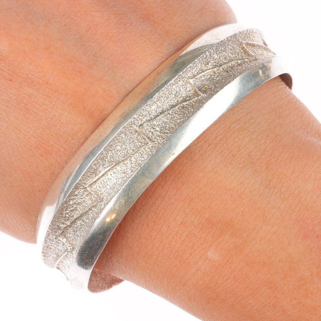 7" A Joe Navajo Tufa Cast sterling silver lightning bolts cuff bracelet