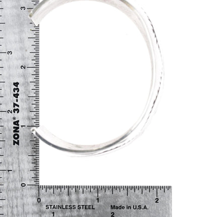7.625" Rick Enriquez Navajo sterling heavily stamped silver wide cuff bracelet