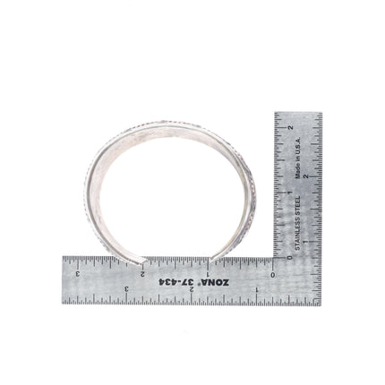 6.5" Patrick Yellowhorse deep stamped sterling silver wide band cuff bracelet