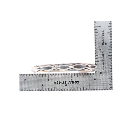 6.5" Tahe Navajo stamped sterling silver carinated cuff bracelet