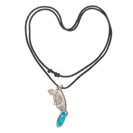 Whirling Wind Ray Morton Navajo Tufa Cast Kokopelli pendant with nice turquoise