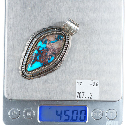 Large Arizona Bisbee turquoise sterling silver pendant by Spencer Navajo