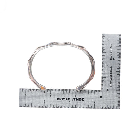 6.5" Tahe Navajo stamped sterling silver carinated cuff bracelet