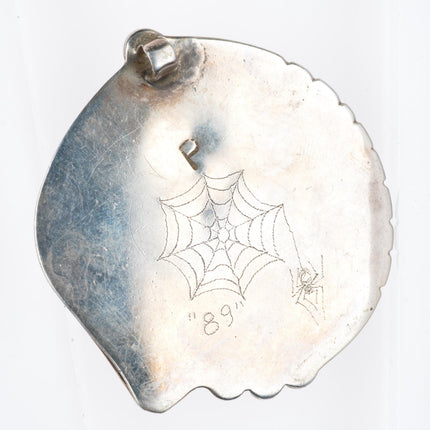 Vintage Native American sterling silver spiderweb turquoise pendant rope bezel