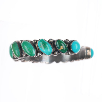 6.5" vintage Navajo greasy green turquoise row sterling silver cuff bracelet