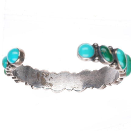 6.5" vintage Navajo greasy green turquoise row sterling silver cuff bracelet
