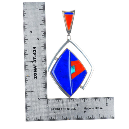 Richard Chavez San Felipe Pueblo coral, lapis, turquoise inlaid pendant