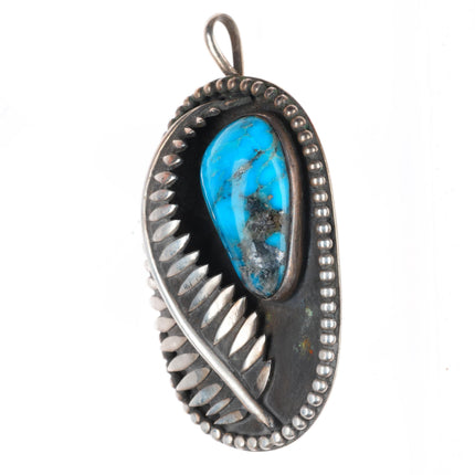 Vintage Native American sterling silver feather pendant with turquoise