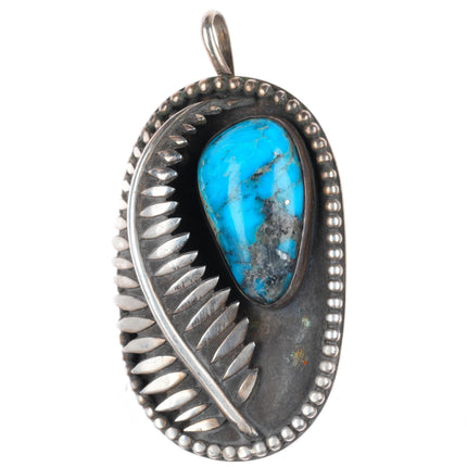Vintage Native American sterling silver feather pendant with turquoise