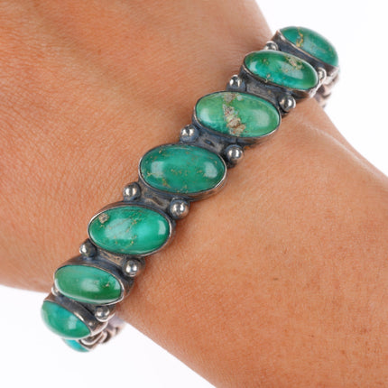 6.5" vintage Navajo greasy green turquoise row sterling silver cuff bracelet