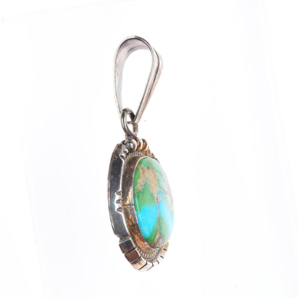 Steve Yellowhorse Navajo sterling silver pendant with nice turquoise