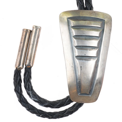 James Faks Blackfoot Native American modernist sterling silver chiseled bolo tie