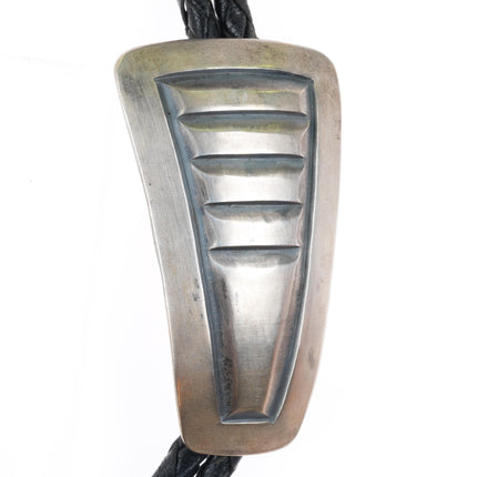 James Faks Blackfoot Native American modernist sterling silver chiseled bolo tie