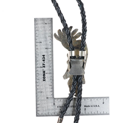 Vintage Navajo sterling silver stamped Kokopelli bolo tie with turquoise
