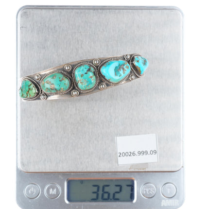 7.1" 1940's-50's Navajo hand stamped sterling silver turquoise row cuff bracelet