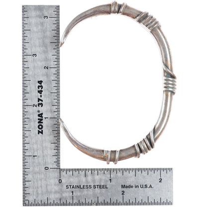 7.5" Orville Tsinnie Navajo sterling silver wire wrapped modernist cuff bracelet