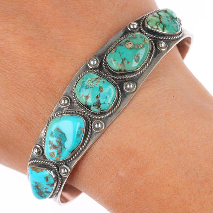 7.1" 1940's-50's Navajo hand stamped sterling silver turquoise row cuff bracelet