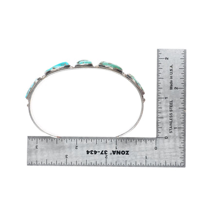 7.1" 1940's-50's Navajo hand stamped sterling silver turquoise row cuff bracelet