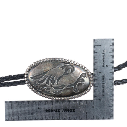 Les Peone Native American sterling silver bolo tie with eagle/talons