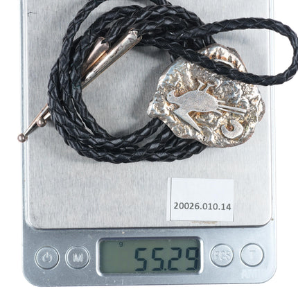 Vintage southwestern sterling silver petroglyph style bolo tie