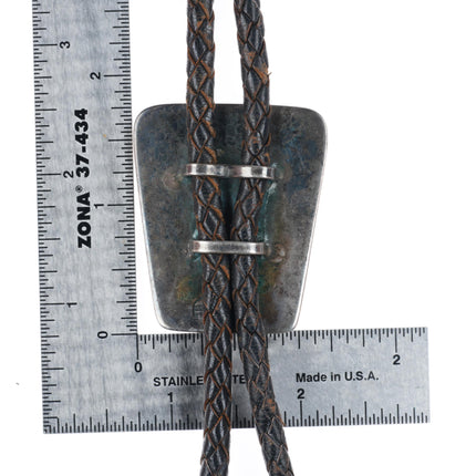 Kenneth Begay Navajo-White Hogan shop sterling silver modernist bolo tie