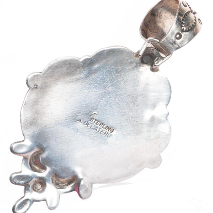 A Secatero Navajo sterling silver Onyx and shell inlay necklace pendant