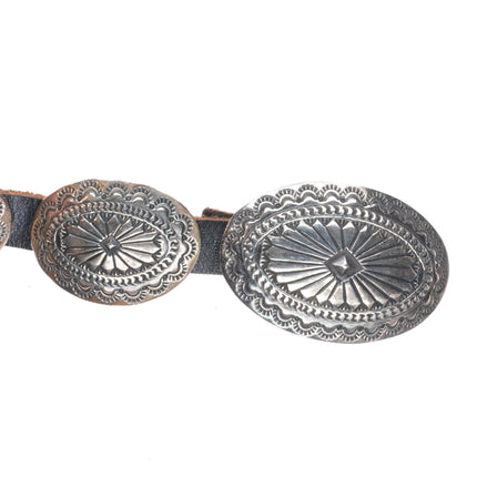 Vintage Navajo deep stamped sterling silver oval concho belt