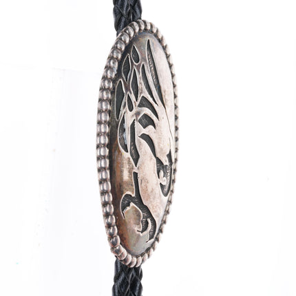 Les Peone Native American sterling silver bolo tie with eagle/talons