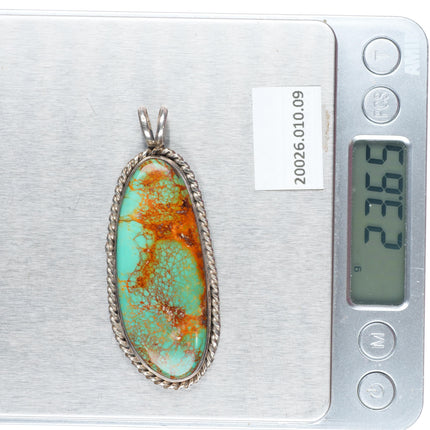 Big Ben Chavez Navajo sterling silver red webbed turquoise pendant