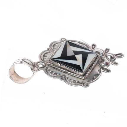 A Secatero Navajo sterling silver Onyx and shell inlay necklace pendant