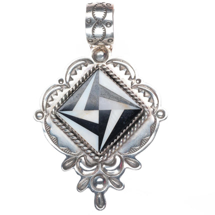 A Secatero Navajo sterling silver Onyx and shell inlay necklace pendant