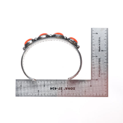 6.6" Larry Elthe Navajo deep stamped sterling silver coral row cuff bracelet