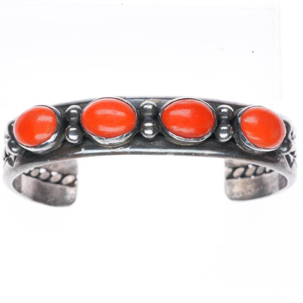 6.6" Larry Elthe Navajo deep stamped sterling silver coral row cuff bracelet