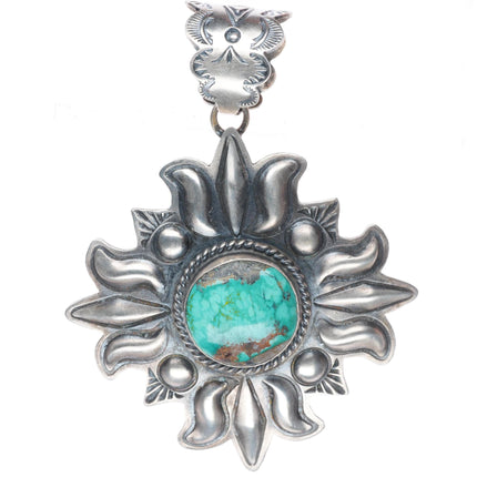 Large Robert Johnson Navajo sterling silver repousse pendant with nice turquoise