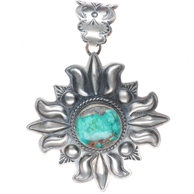 Large Robert Johnson Navajo sterling silver repousse pendant with nice turquoise