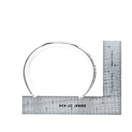 7.4" Mark Tawahongva Hopi overlay sterling silver man in the maze cuff bracelet
