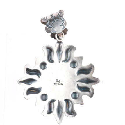 Large Robert Johnson Navajo sterling silver repousse pendant with nice turquoise