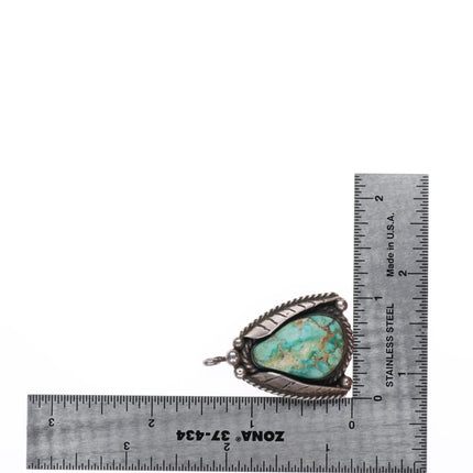Vintage Navajo sterling silver turquoise pendant with side feathers
